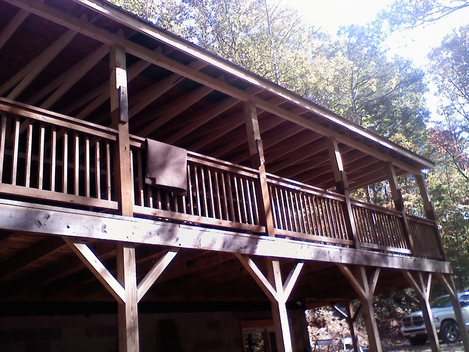 Timber framing under a new elevated porch and deck — Roof Leak Repair in Cedar Springs by Roofing Brothers